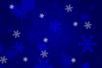 Abstract blue winter background with snowflakes.