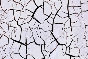 Cracks background from old light gray paint and rust