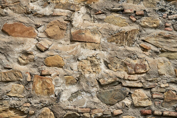Rock stone texture. A wall built of mountain stones