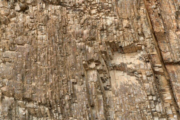 Rock stone texture. The nature of the stone. Close-up photo of a rock