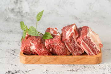 raw beef ribs are on the table