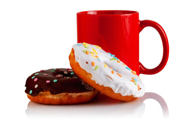 Donuts with icing and a mug of coffee