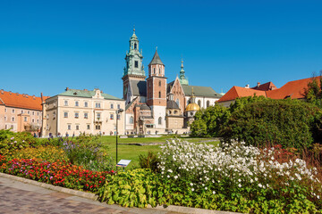 Fototapeta Wawel Royal Castle in Krakow, Poland, Royal gardens and Wawel Cathedral, clear blue sky in the background. obraz