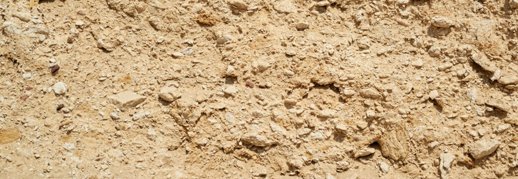 Natural texture sandstone, sun lighting, stone background