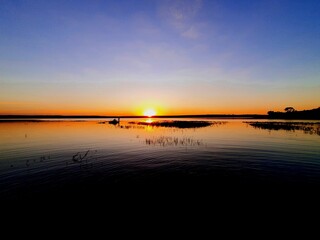 sunset, sky, water, sea, sun, ocean, sunrise, lake, clouds, landscape, cloud, nature, beach, orange, reflection, evening, blue, horizon, beautiful, sunlight, summer, dusk, coast, waves, wave