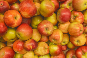 Red ripe apples fresh fruit healthy food on supermarket counter background