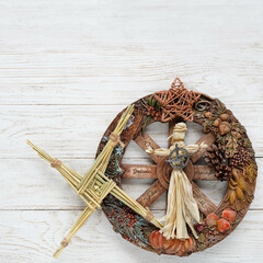 Wiccan altar for Imbolc sabbat. pagan festive ritual. wheel of the year, Brigid's cross  from...