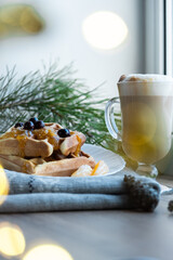 winter good breakfast in the morning Viennese waffles coffee cappuccino