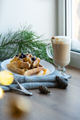 winter good breakfast in the morning Viennese waffles coffee cappuccino