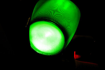 Green traffic light in evening