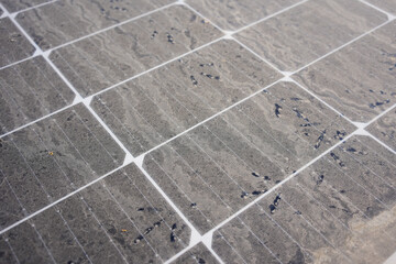 Fototapeta premium Dirty dust on the solar panel, Dust blocking off the sunlight exposure to reduce efficiency of solar energy.