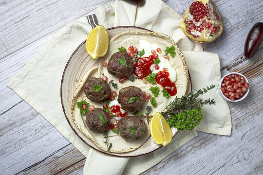 Traditional homemade beef and lamb meatballs with arabic bread