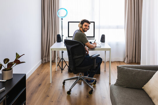 Designer working on computer with graphic tablet
