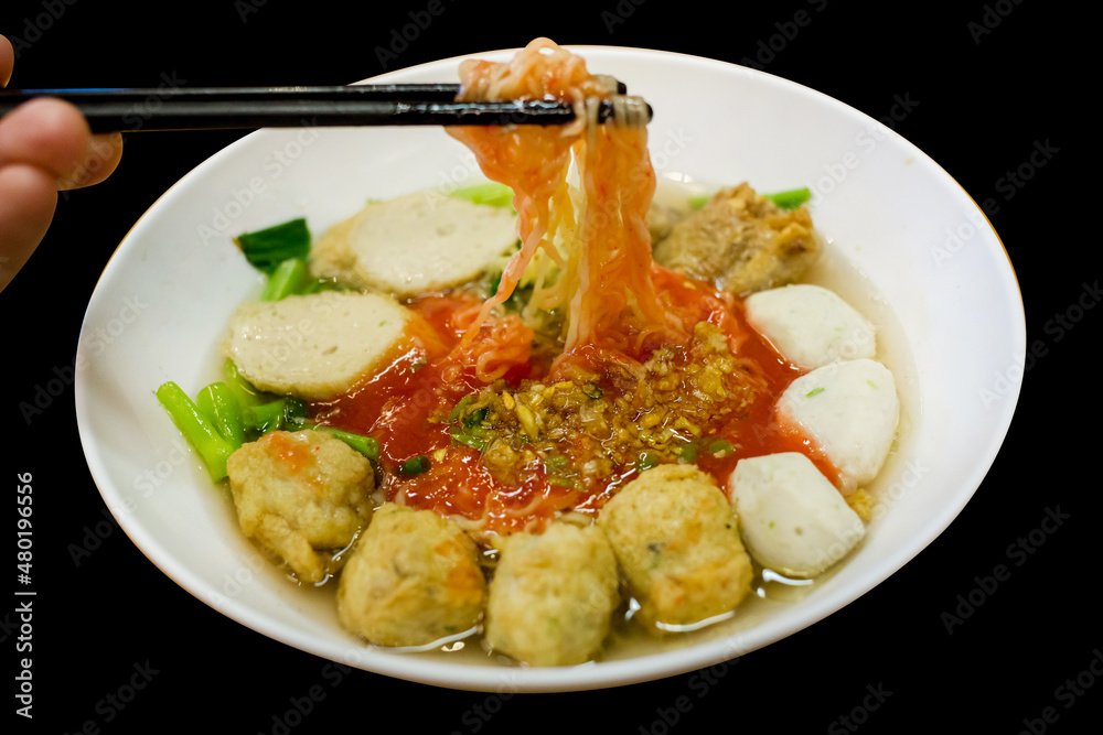 Wall mural Die cut of Fish Ball Noodles on black isolated.