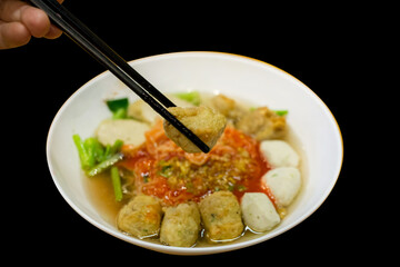 Die cut of Fish Ball Noodles on black isolated.