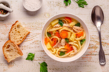 Chicken soup with noodles and vegetables