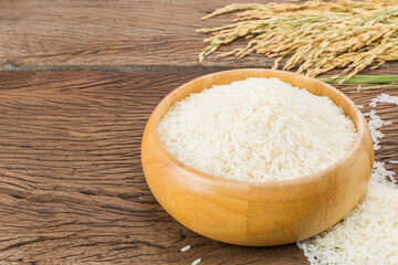 Fototapeta na wymiar Close-up of white rice or jasmine rice in a wooden bowl
