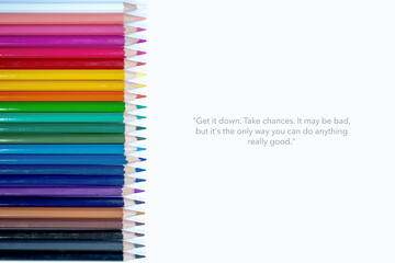 Get it down. Take chances. It may be bad, but it's the only way you can do anything really good. Motivational quote on white background with color pencil  