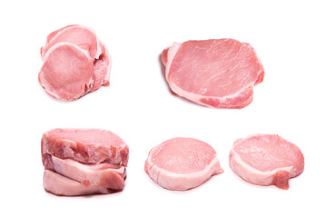 Raw pork pieces isolated on a white background.
