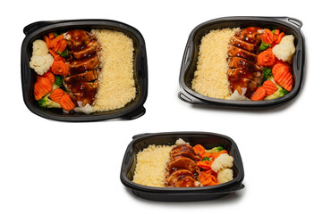 Ready food in a container. Stewed chicken in teriyaki sauce, stewed carrot, cabbage and porridge.