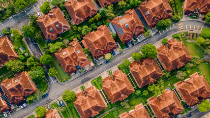 An aerial top down view of luxury residential neighbourhood during sunrise