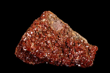 Macro mineral stone Vanadinite on a black background