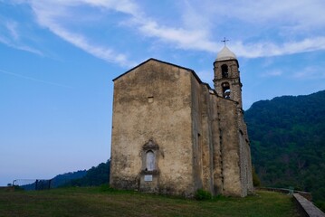 Fototapeta na wymiar Santa Reparata church in Santa-Reparata-di-Moriani, a dreamy mountain village nestled in the mountains of Castagniccia. Corsica, France.