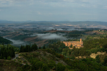 Fototapeta na wymiar Italy.Tuscany, province of Siena, Asciano, Abbey of Monte Oliveto Maggiore, Benedictine monastery, top view