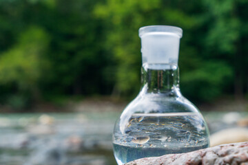 Glass flask with clean drinking water.