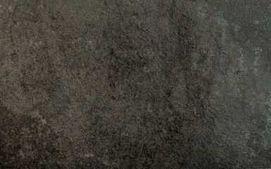 Background Stone wall background with abstract spots. Beautiful gray marble texture with stains, abstract surface background. Finishing stone for building cladding. Furniture granite.