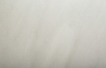 Background Stone wall background with abstract spots. Beautiful gray marble texture with stains, abstract surface background. Finishing stone for building cladding. Furniture granite.