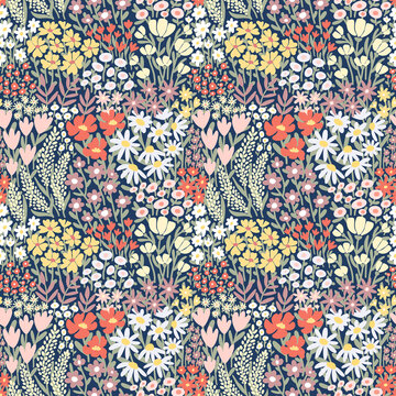 Ditsy floral seamless pattern. Many various Summer Flowers on blue background. Full Meadow Wildflower texture. Liberty style motif for fashion print, textile, fabric, cover, wrap, gift paper