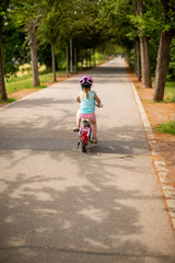 child riding a bike