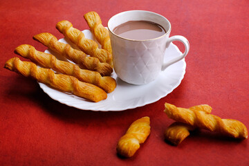 Indian khari or kharee or salty Puffy brown Snacks, served with indian hot tea, Indian Breakfast.