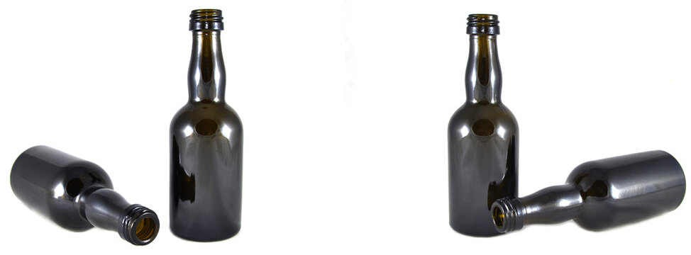 Wine bottle on a white background close-up. Glass, vessel, neck, wallpaper, background, texture, alcoholism