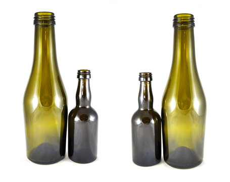 Wine bottle on a white background close-up. Glass, vessel, neck, wallpaper, background, texture, alcoholism