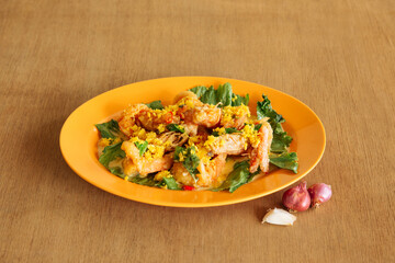 Carnation Butter Prawn with raw onion and garlic isolated wood background top view, Asian seafood
