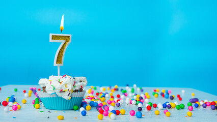 Beautiful birthday greetings to a seven-year-old child on a blue background, card for 7 years happy...