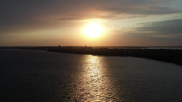 Sunset over Lake Monona in Madison Wisconsin - Downtown in Distance (Drone - Left to Right)