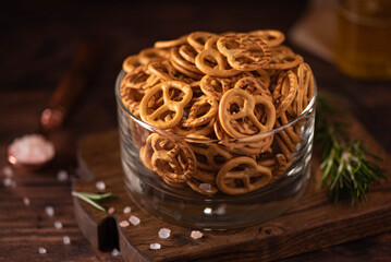 small salted pretzels with salt and spices in a glass bowl