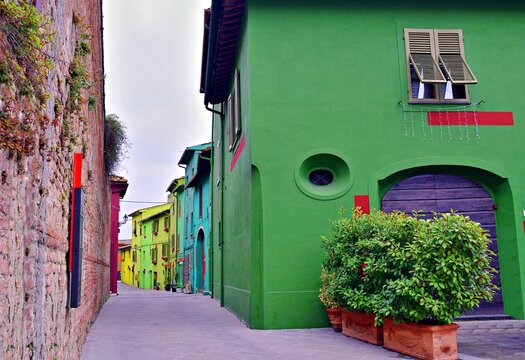 cityscape of Ghizzano, a small colorful village in the municipality of Peccioli in Pisa, Tuscany, Italy