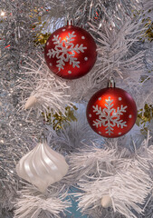 Christmas toys on the Christmas tree balls sequins snowflakes tinsel