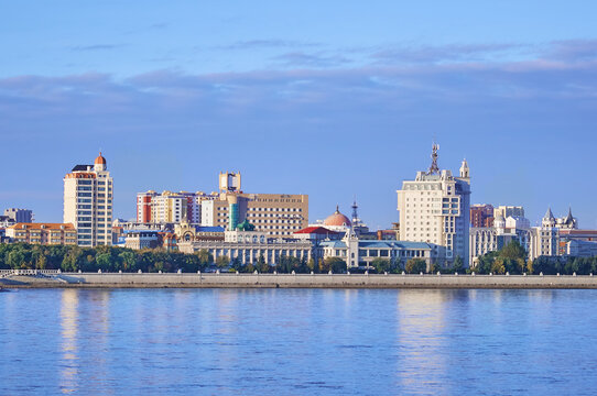 Russian-Chinese border along the Amur River. View from the embankment of the city of Blagoveshchensk, Russia to the city of Heihe, China. A mixture of architectural styles.