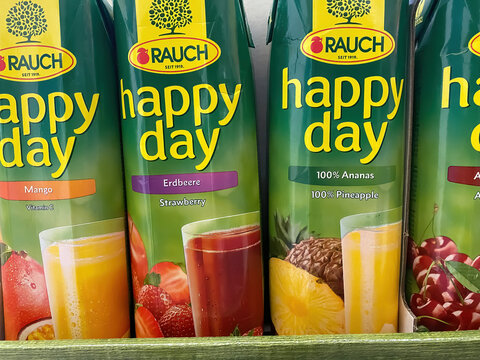 Viersen, Germany - January 9. 2022: Closeup of rauch happy day fruit juice bags in shelf of german supermarket