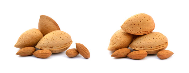 Heap of fresh almonds in shells isolated on white background