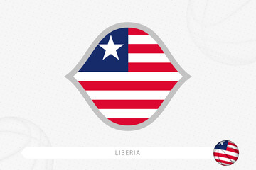 Liberia flag for basketball competition on gray basketball background.