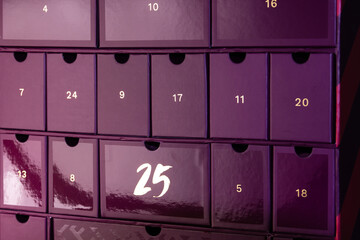 Burgundy advent calendar. Cells with numbers of different sizes. A Christmas gift.