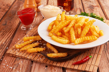 french fries on wooden table