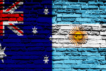 Background with flag of Argentina and Australia on a brick wall