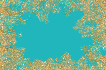 Golden snowflakes on a blue background. Crystallized particles on a light blue background. Festive, Christmas, winter.